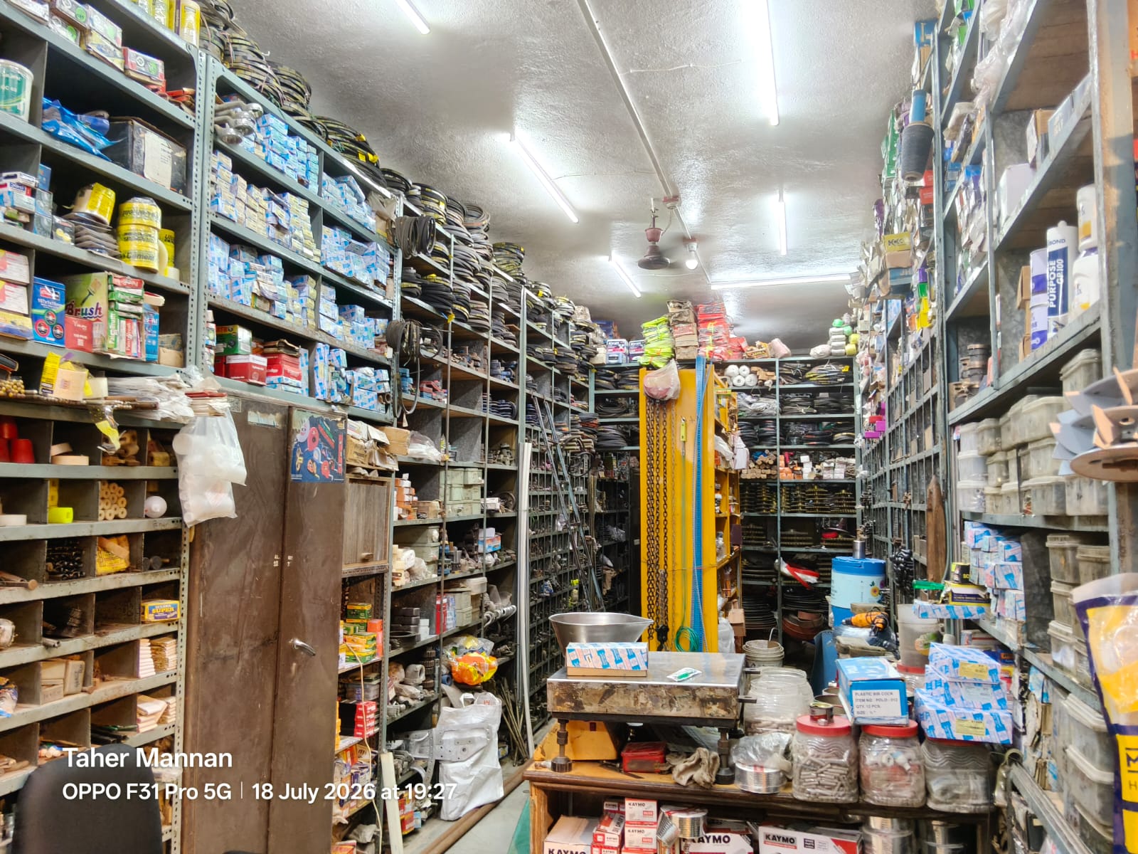 Mannan Traders showroom interior with INGCO power tools and industrial hardware displayed on shelves in Burhanpur